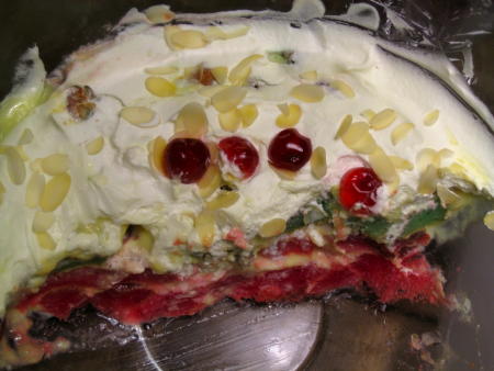 Trifle, half of which has been eaten already