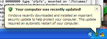 Windows bubble saying: 'Your computer was recently updated! - Windows recently downloaded and installed an important security update to help protect your computer. This update required an automatic restart of your computer.